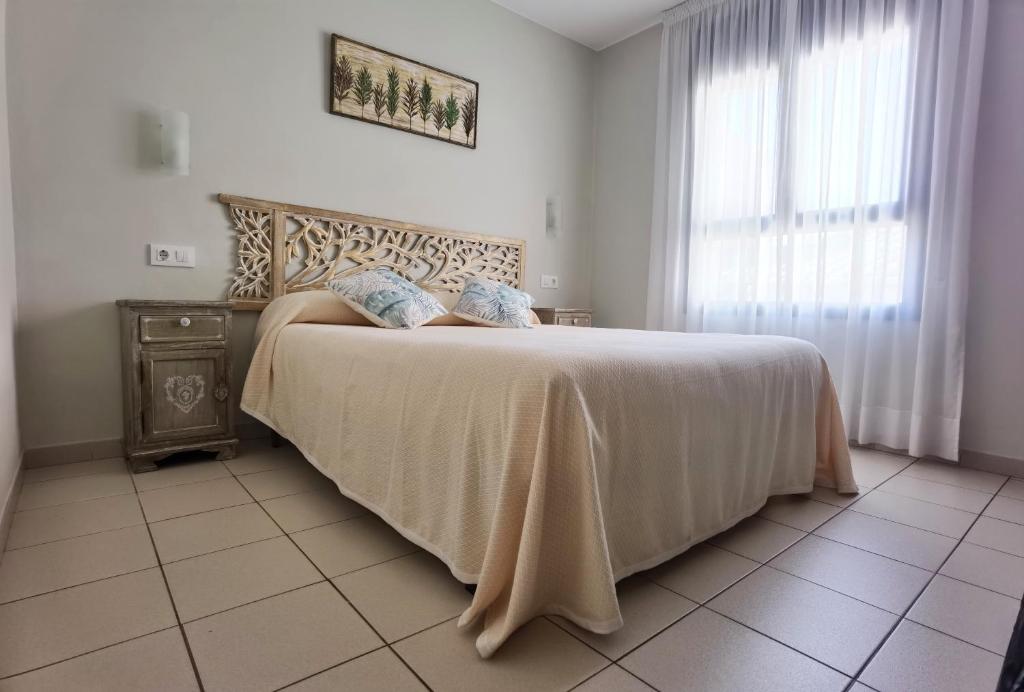 Postel nebo postele na pokoji v ubytování HOSTAL RIGAU