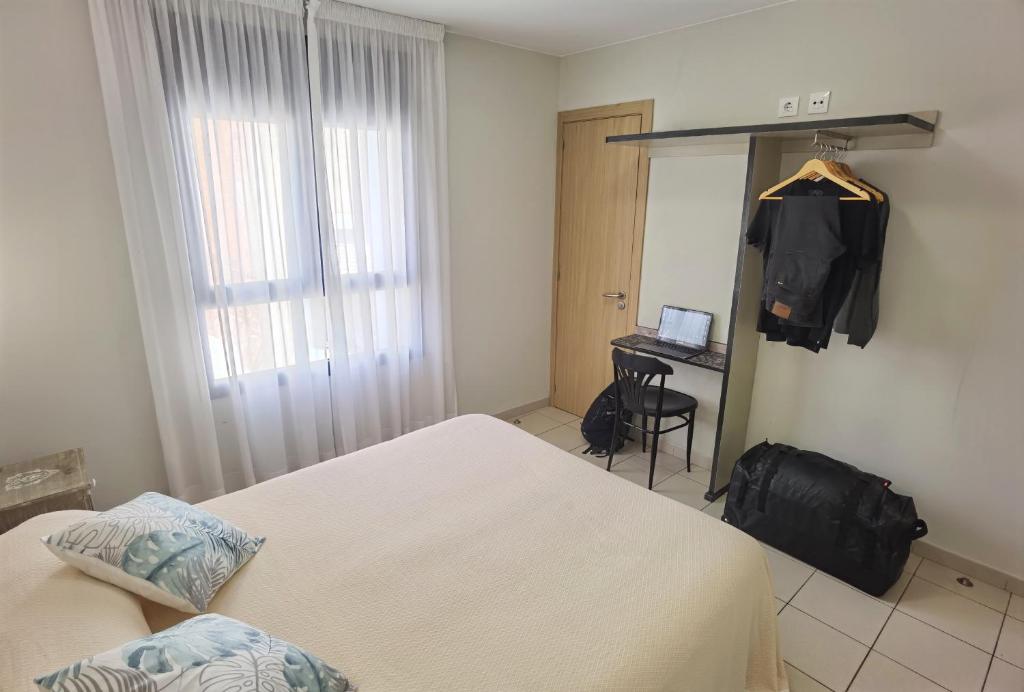 Postel nebo postele na pokoji v ubytování HOSTAL RIGAU