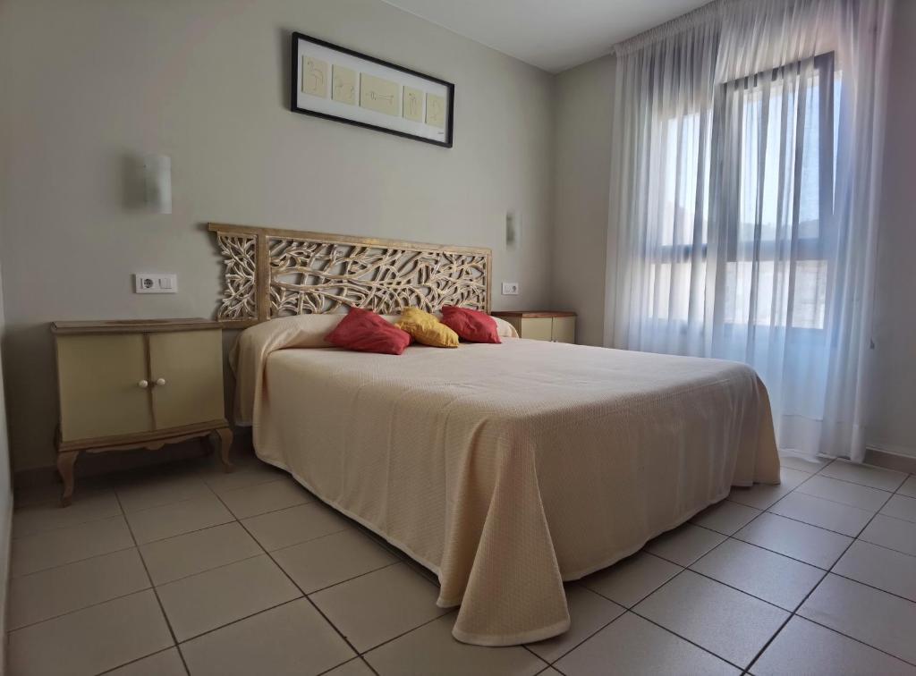 Postel nebo postele na pokoji v ubytování HOSTAL RIGAU