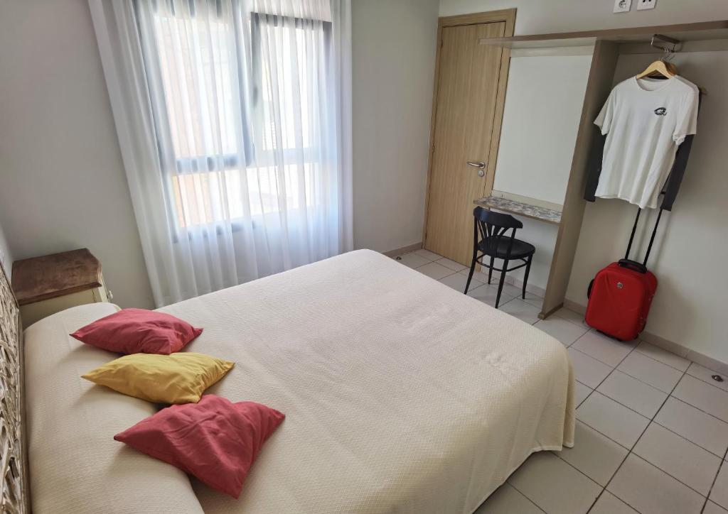 Postel nebo postele na pokoji v ubytování HOSTAL RIGAU