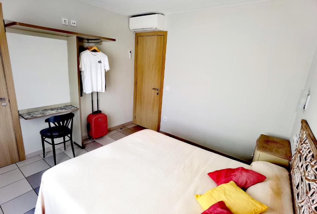 Postel nebo postele na pokoji v ubytování HOSTAL RIGAU
