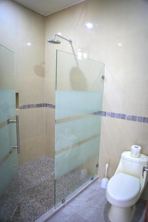 Koupelna v ubytování Hotel Alux