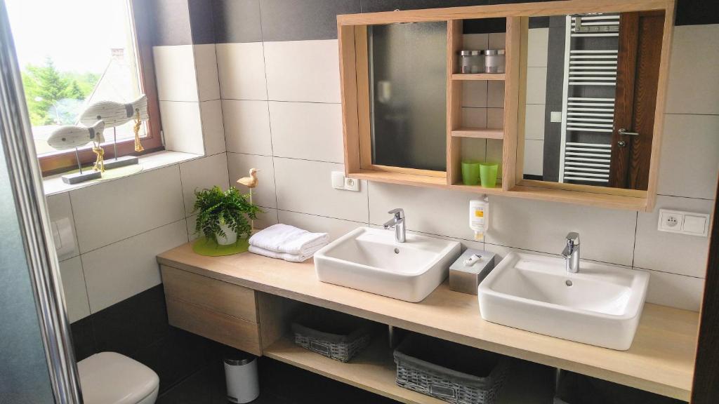 Koupelna v ubytování Apartmány Fišerovi