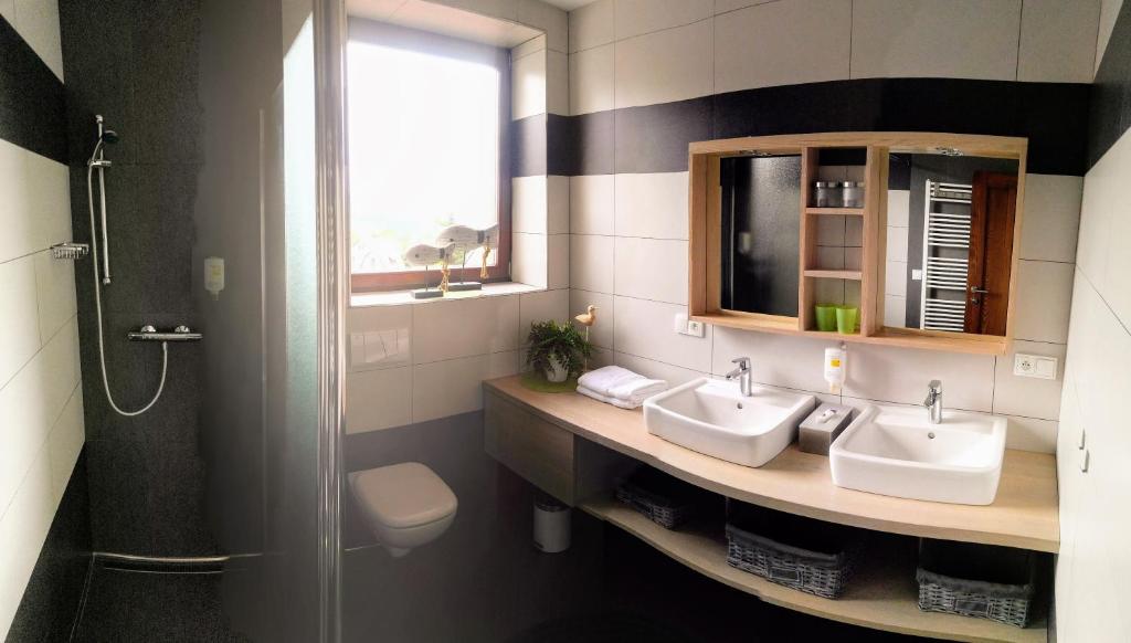 Koupelna v ubytování Apartmány Fišerovi