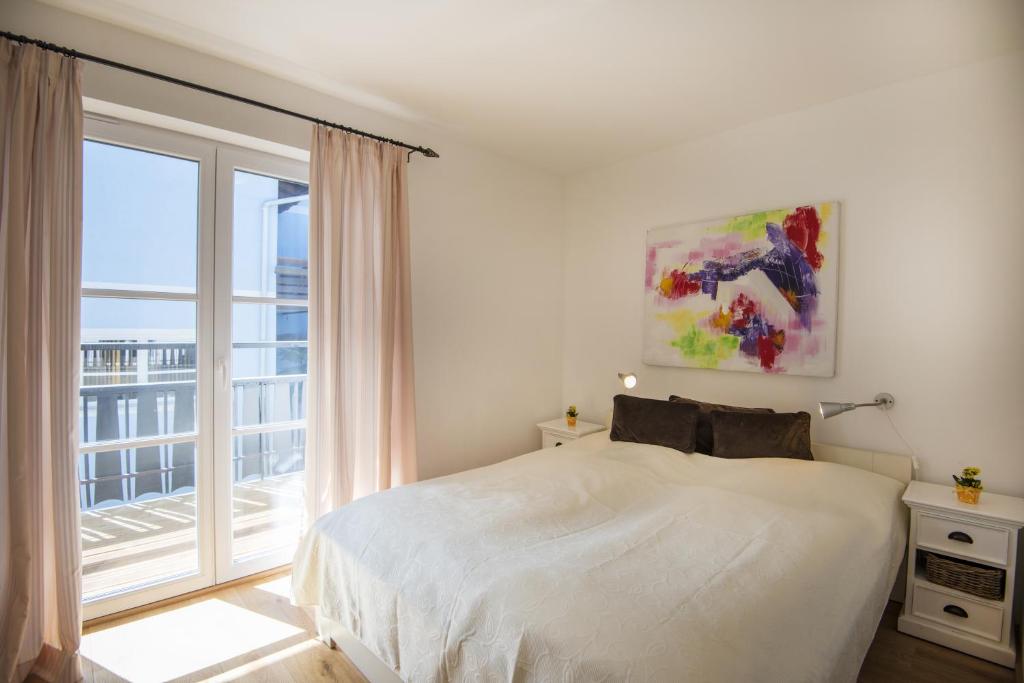 Postel nebo postele na pokoji v ubytování Haus Wasmer by AlpenTravel