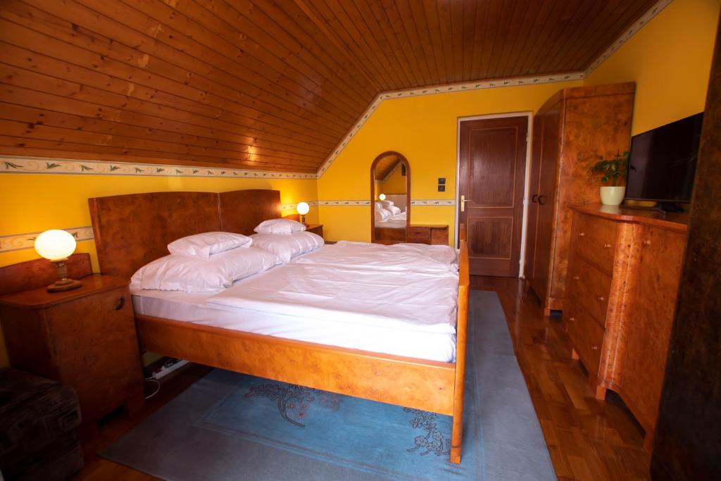 Posteľ alebo postele v izbe v ubytovaní Farkas Guesthouse
