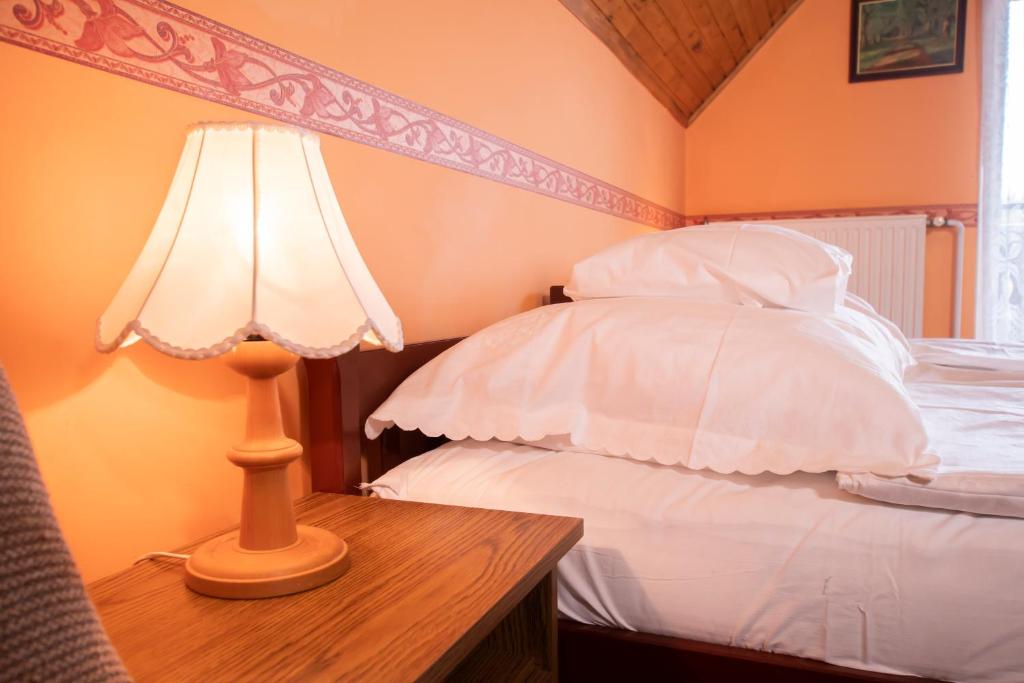 Posteľ alebo postele v izbe v ubytovaní Farkas Guesthouse