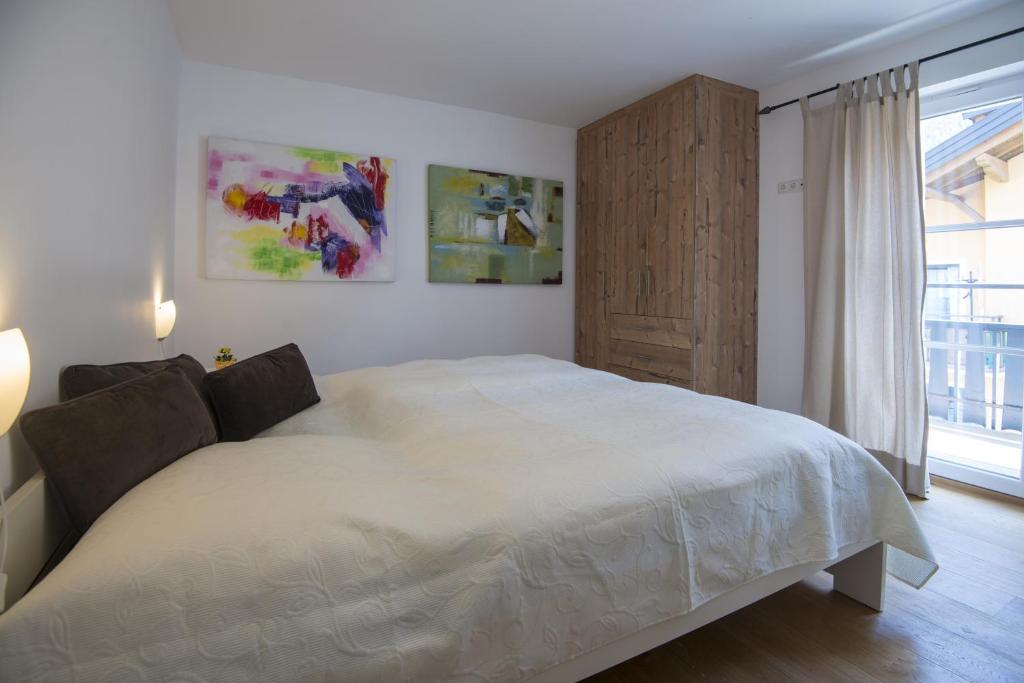 Postel nebo postele na pokoji v ubytování Haus Wasmer by AlpenTravel