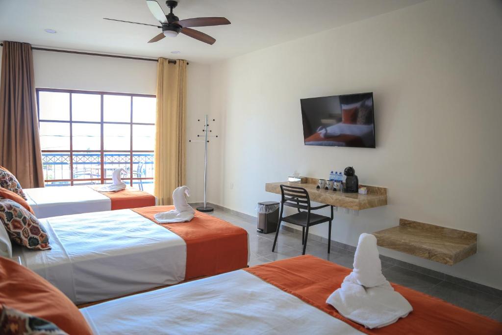 Postel nebo postele na pokoji v ubytování Hotel Alux