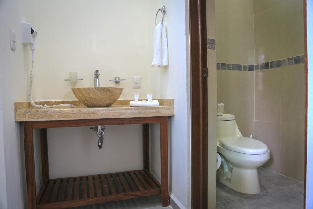 Koupelna v ubytování Hotel Alux