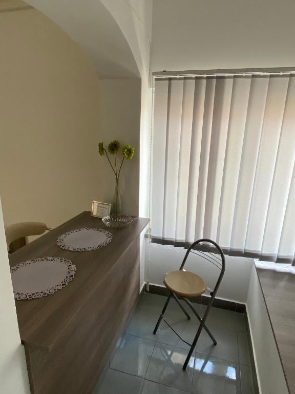 Postel nebo postele na pokoji v ubytování Tocc Apartman