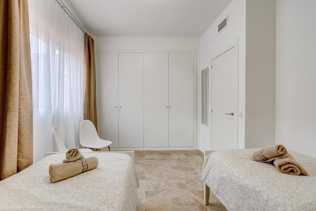 Postel nebo postele na pokoji v ubytování Casa del Sol