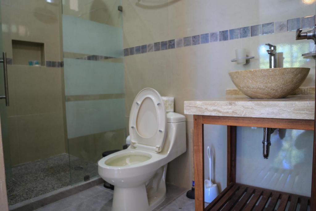 Koupelna v ubytování Hotel Alux
