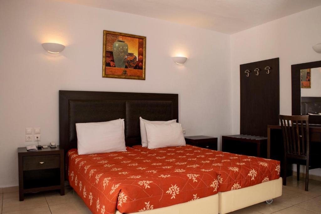 Postel nebo postele na pokoji v ubytování Giannoulaki Resort
