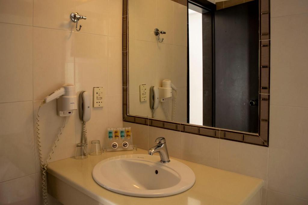Koupelna v ubytování Giannoulaki Resort