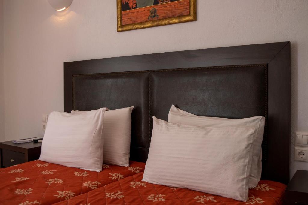 Postel nebo postele na pokoji v ubytování Giannoulaki Resort