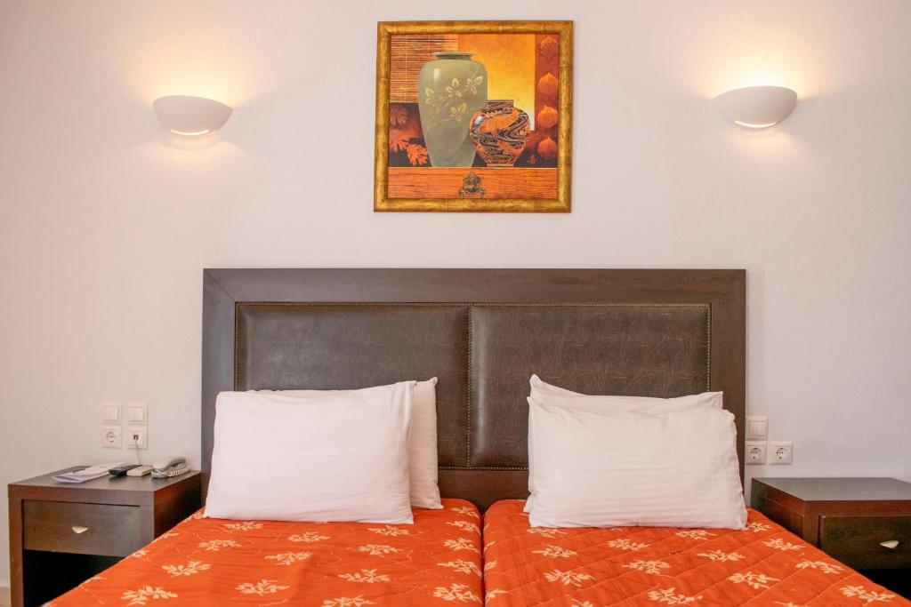 Postel nebo postele na pokoji v ubytování Giannoulaki Resort
