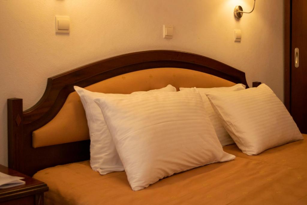 Postel nebo postele na pokoji v ubytování Giannoulaki Resort