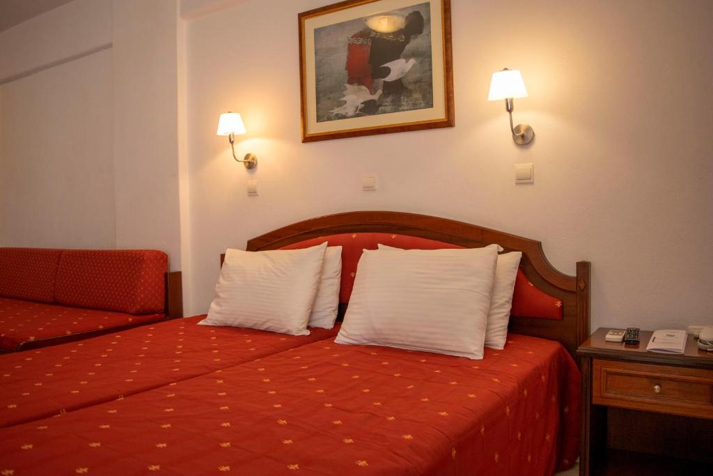 Postel nebo postele na pokoji v ubytování Giannoulaki Resort