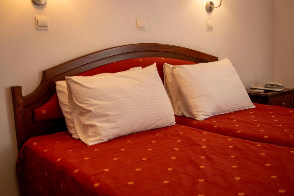 Postel nebo postele na pokoji v ubytování Giannoulaki Resort
