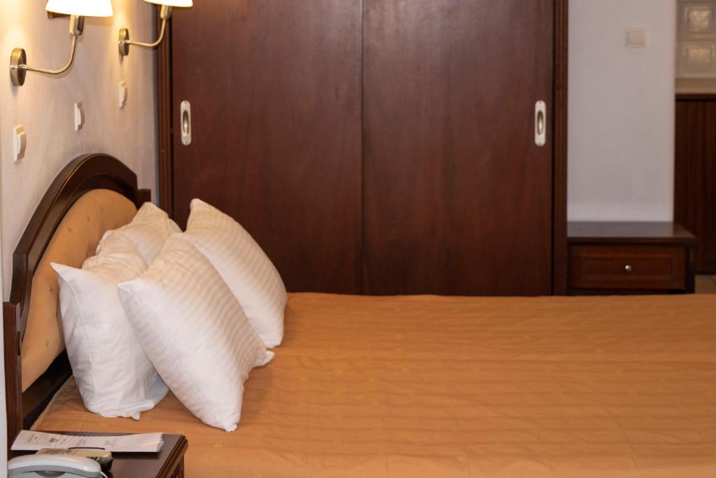 Postel nebo postele na pokoji v ubytování Giannoulaki Resort