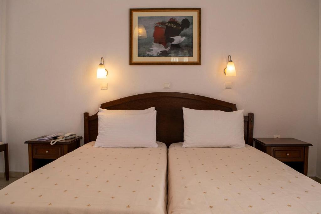 Postel nebo postele na pokoji v ubytování Giannoulaki Resort