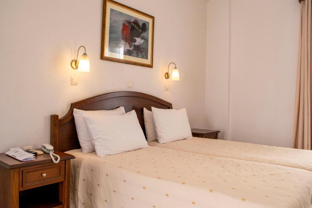 Postel nebo postele na pokoji v ubytování Giannoulaki Resort