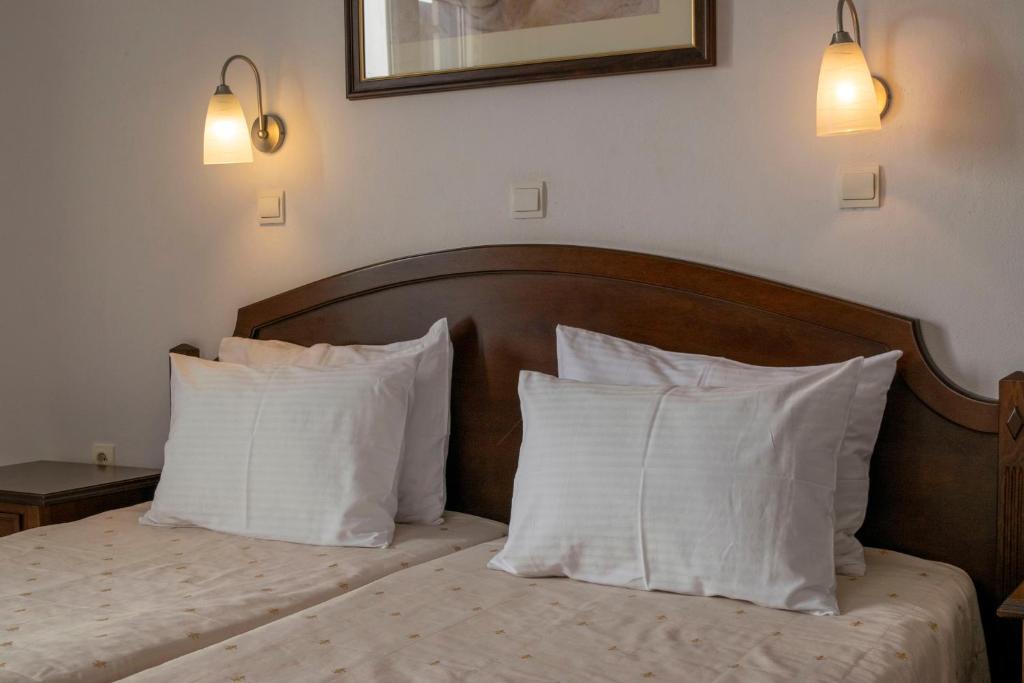Postel nebo postele na pokoji v ubytování Giannoulaki Resort