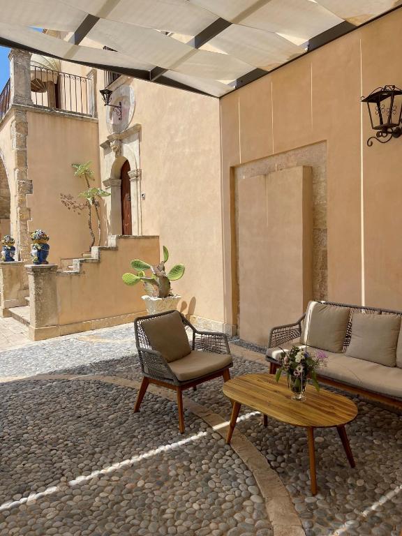 Posezení v ubytování Chiusa Di Carlo Agriturismo