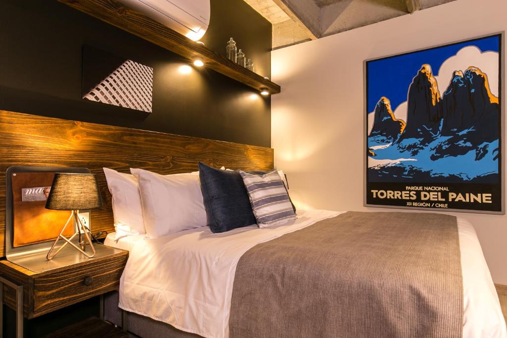 Postel nebo postele na pokoji v ubytování Factory Lofts Hotel