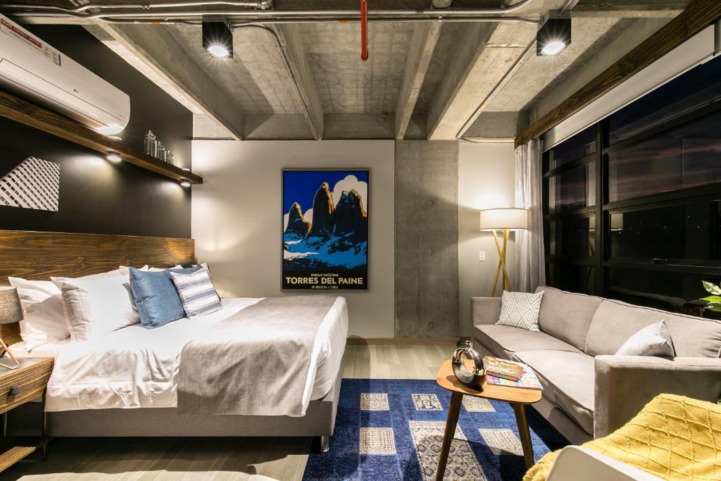 Postel nebo postele na pokoji v ubytování Factory Lofts Hotel
