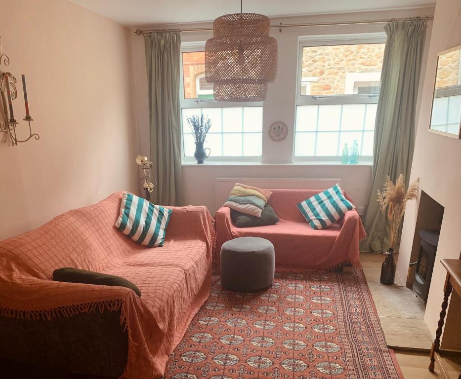 En eller flere senger på et rom på Comfy 3BD Home with Patio in Peaceful Ilminster