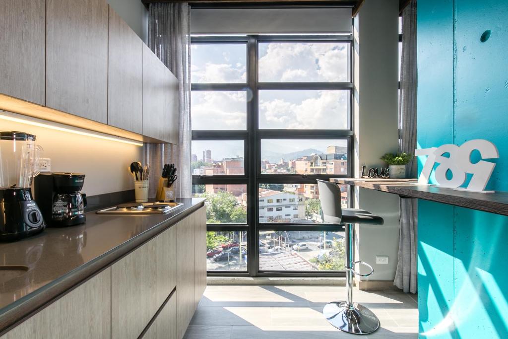Kuchyň nebo kuchyňský kout v ubytování Factory Lofts Hotel