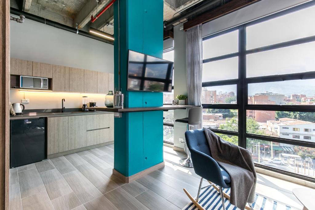 Kuchyň nebo kuchyňský kout v ubytování Factory Lofts Hotel