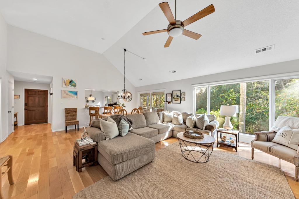 a living room with a couch and a ceiling fan at 2713 Seabrook Island Road in Seabrook Island