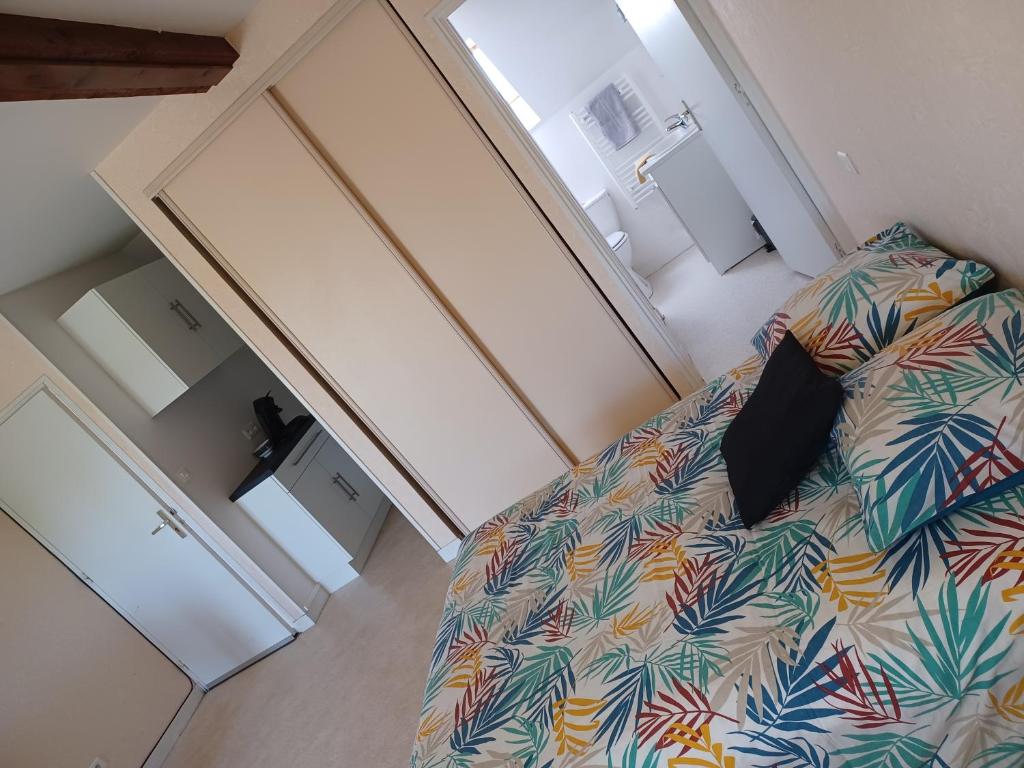Postel nebo postele na pokoji v ubytování Studio avec vue sur la Baie