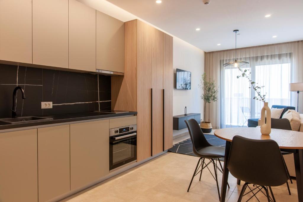 Kuchyň nebo kuchyňský kout v ubytování Soho Suites