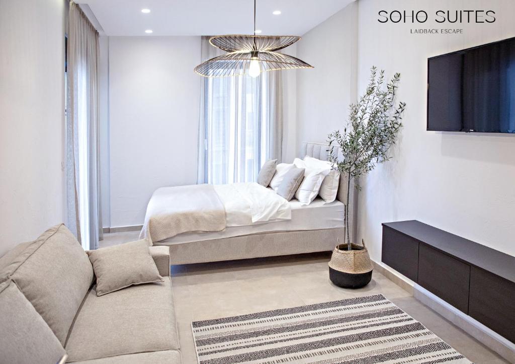 Postel nebo postele na pokoji v ubytování Soho Suites