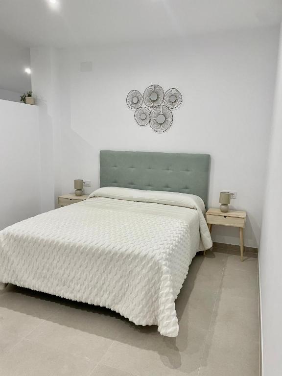 Postel nebo postele na pokoji v ubytování Apartamento Antonio