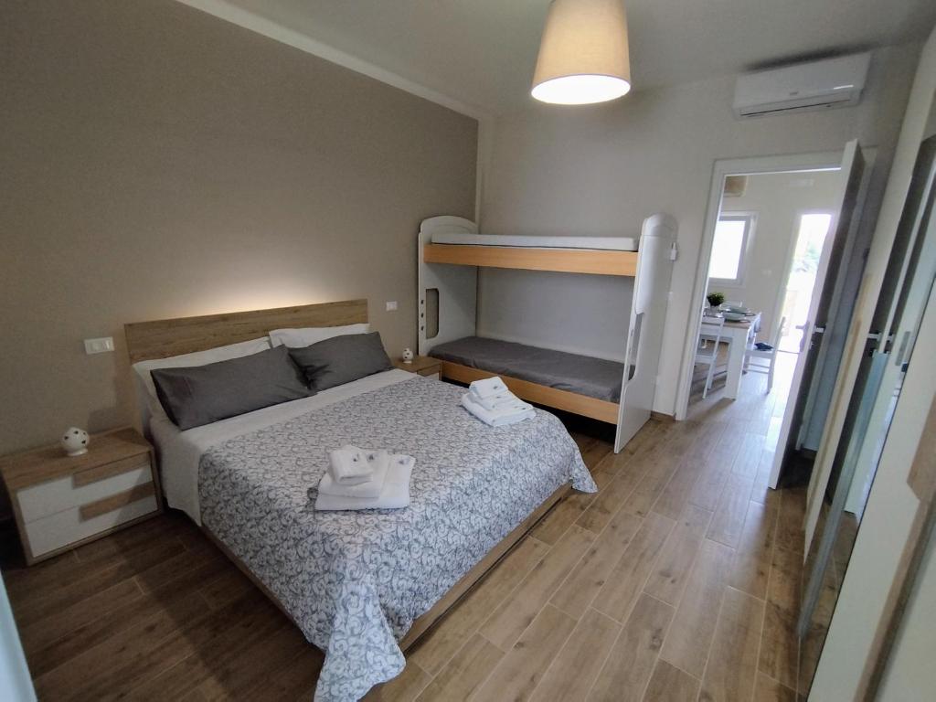 Кровать или кровати в номере BlueSun Apartments