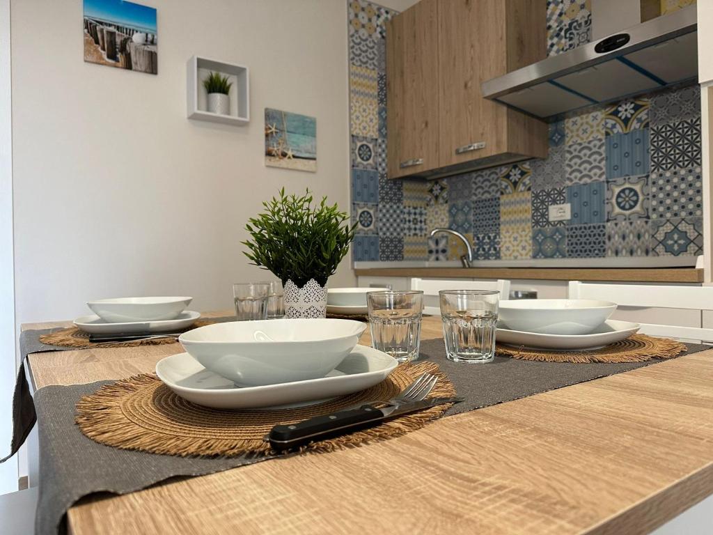Кухня или мини-кухня в BlueSun Apartments
