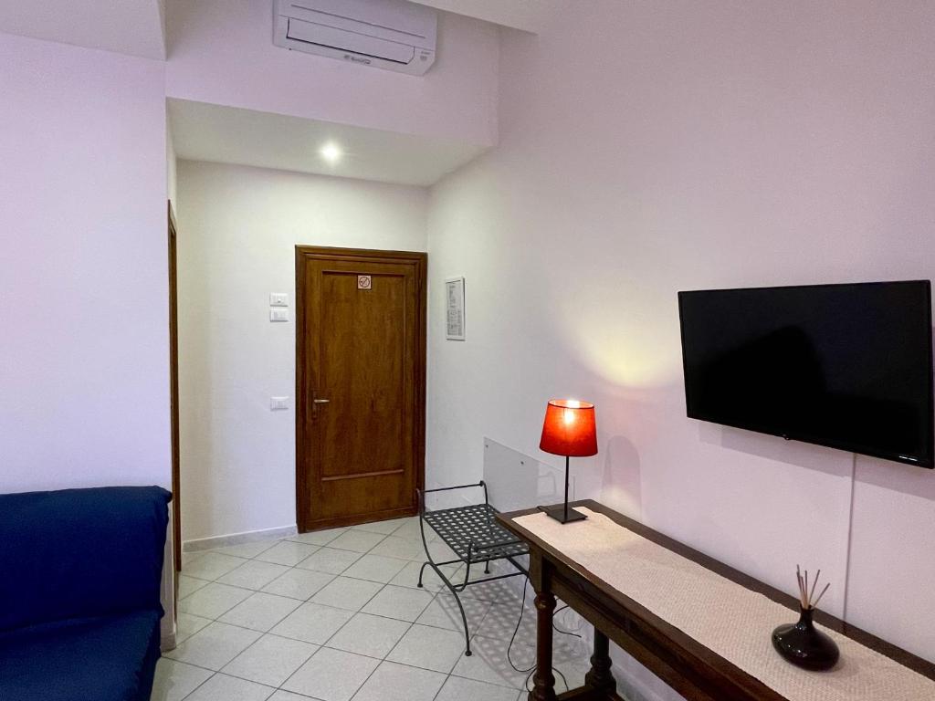 TV a/nebo společenská místnost v ubytování Hotel Leopolda