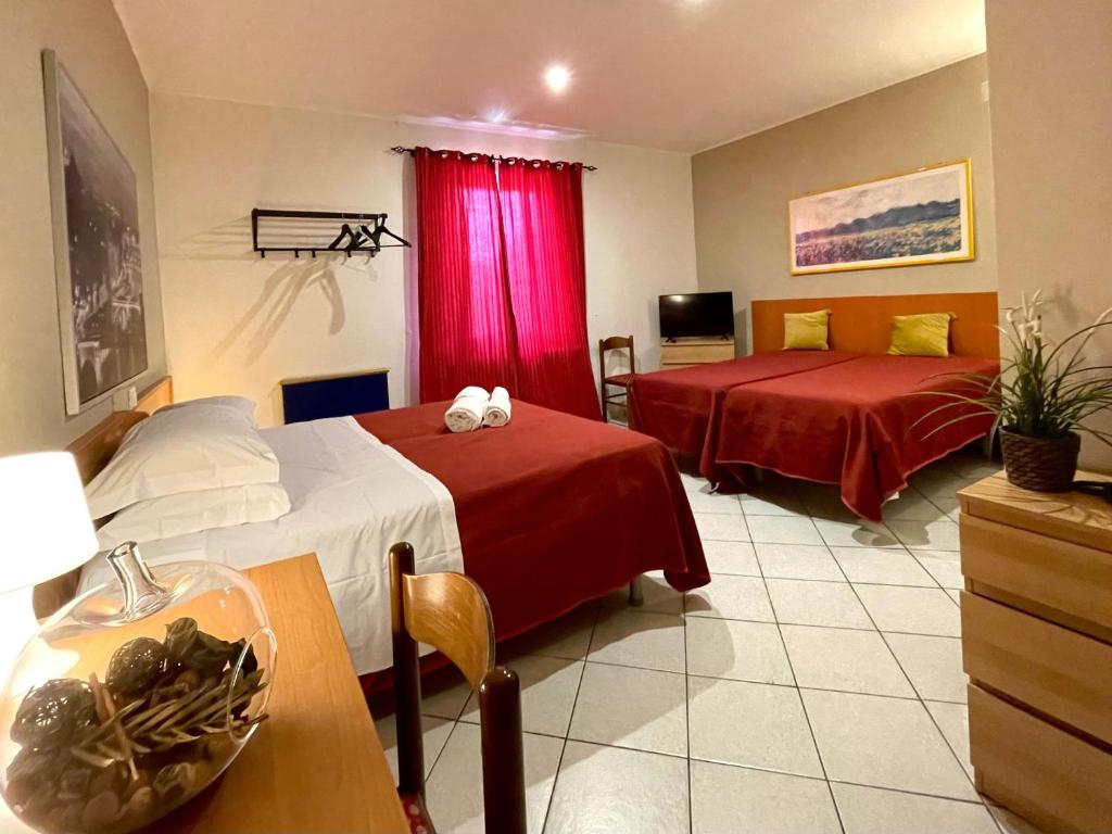 Postel nebo postele na pokoji v ubytování Hotel Leopolda