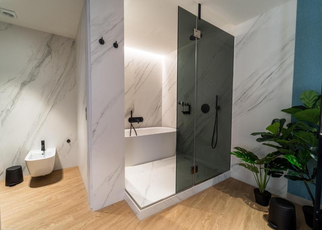 a bathroom with a shower and a sink at Hotel Taburiente S.C.Tenerife in Santa Cruz de Tenerife