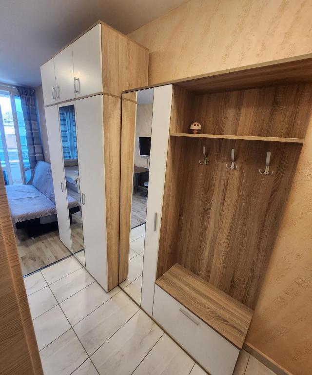 Postel nebo postele na pokoji v ubytování Colonel apartment 944