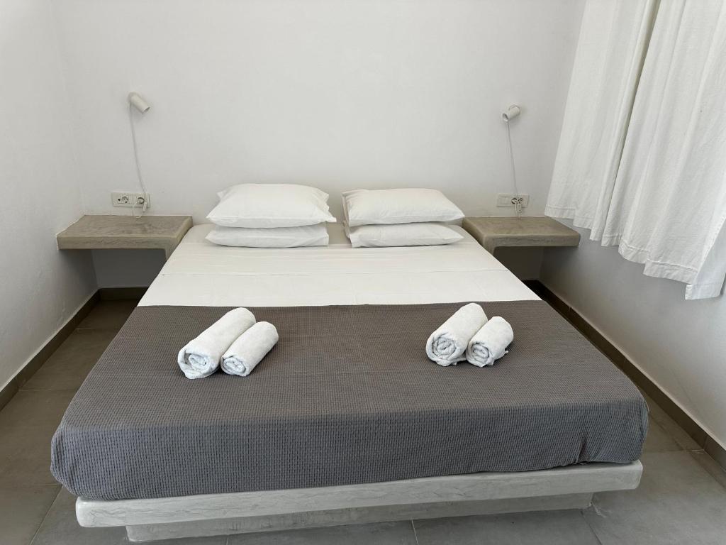 Ένα ή περισσότερα κρεβάτια σε δωμάτιο στο Niabelo Villa