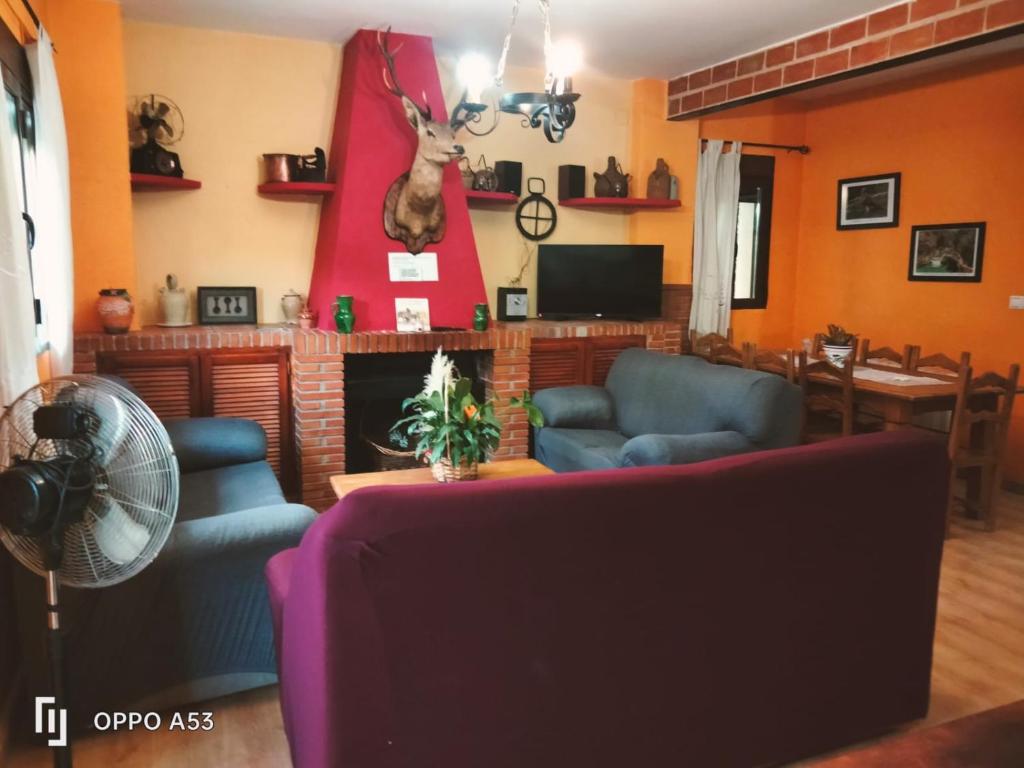 Televízia a/alebo spoločenská miestnosť v ubytovaní Casa el Tío Enrique