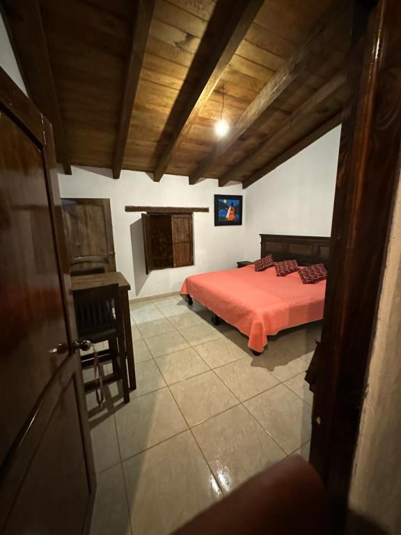 Postel nebo postele na pokoji v ubytování Hotel del Pozo