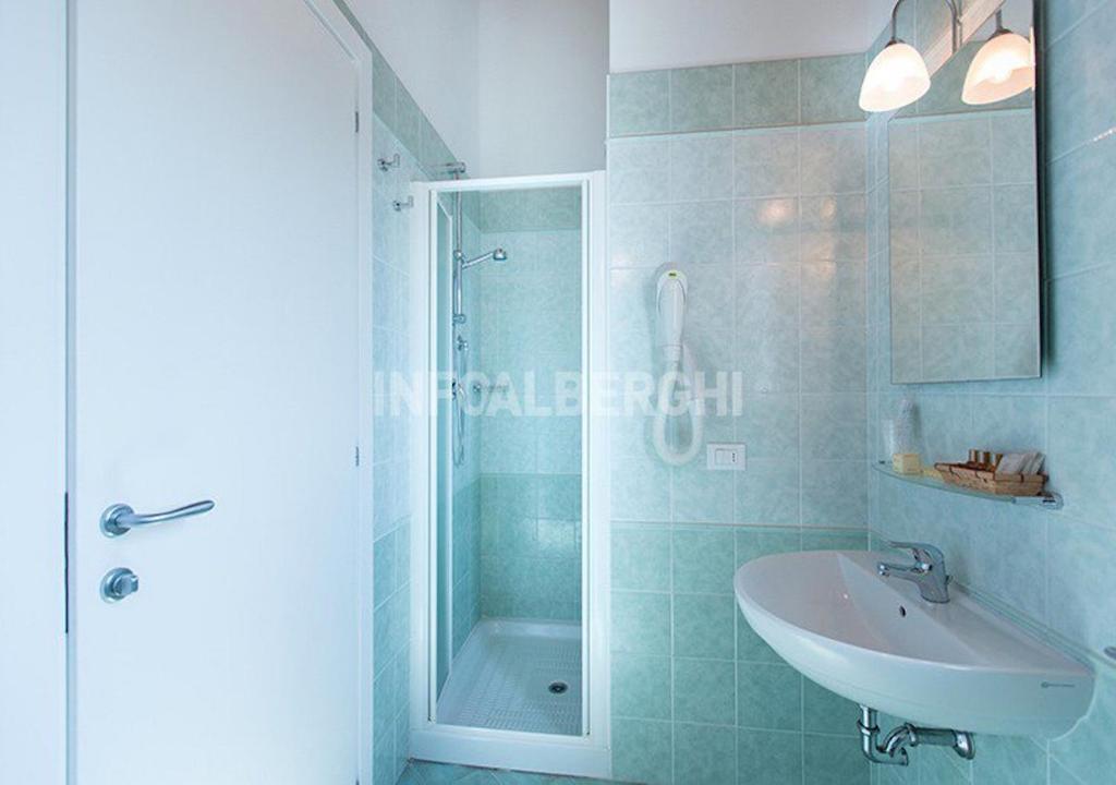 Koupelna v ubytování Hotel Sasselli