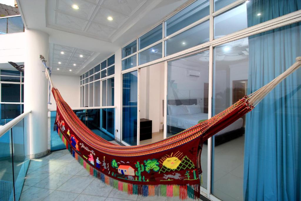 Uma área de estar em Hotel Abi Inn By GEH Suites